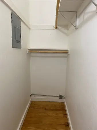 a view of a room with racks on the wall