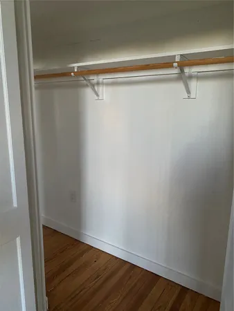 a view of a room with racks on the wall