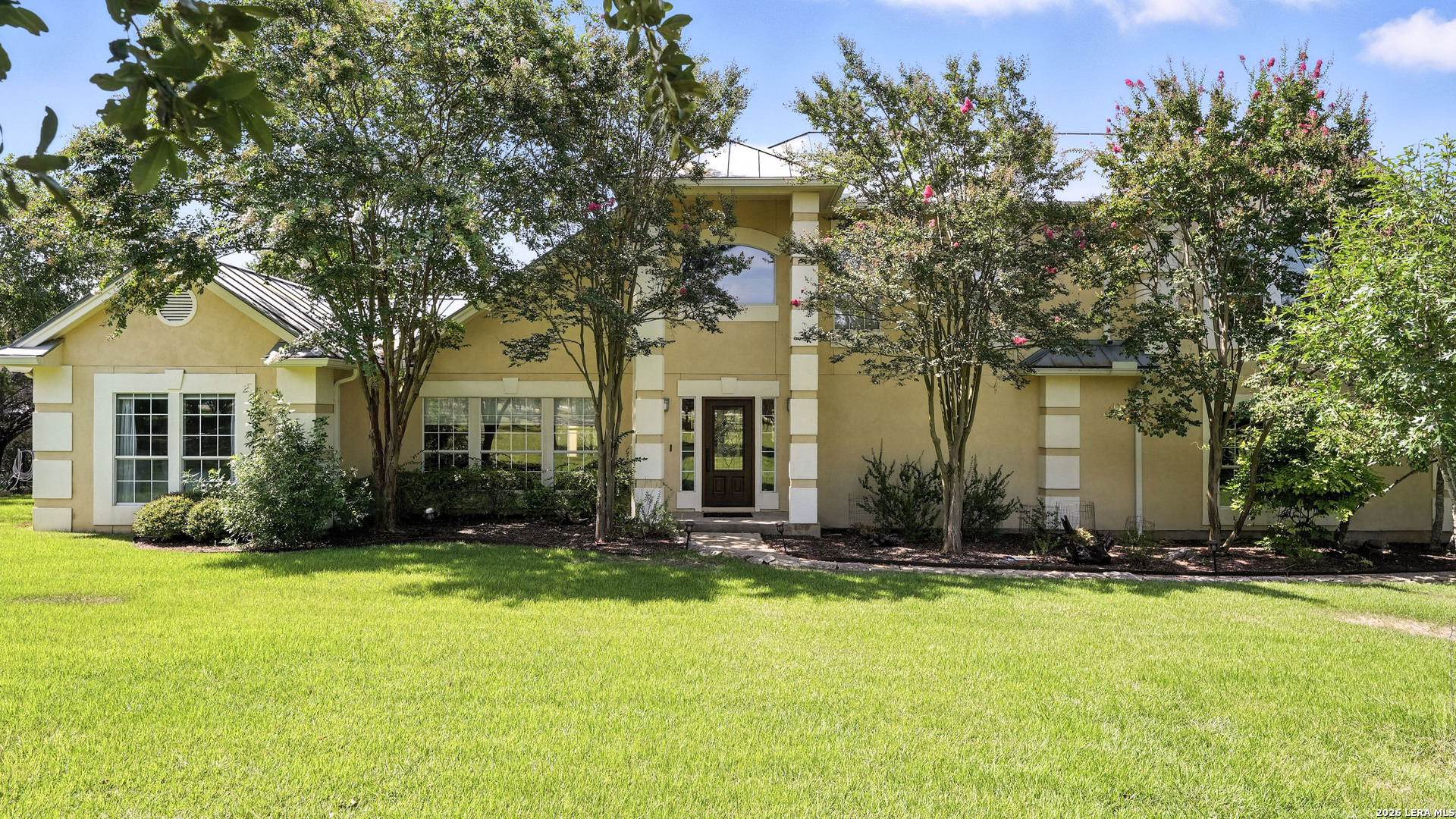 731 Vista Ridge Canyon Lake, TX 78133 - Photo 1 of 1 a front view of house with yard and green space