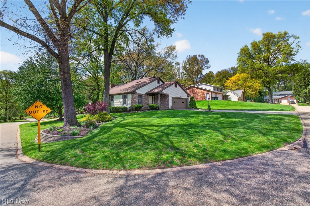 5346 Burlawn Street Northwest Canton, OH 44708 - Photo 4 of 40 Manicured front lawn with mature trees and established landscaping