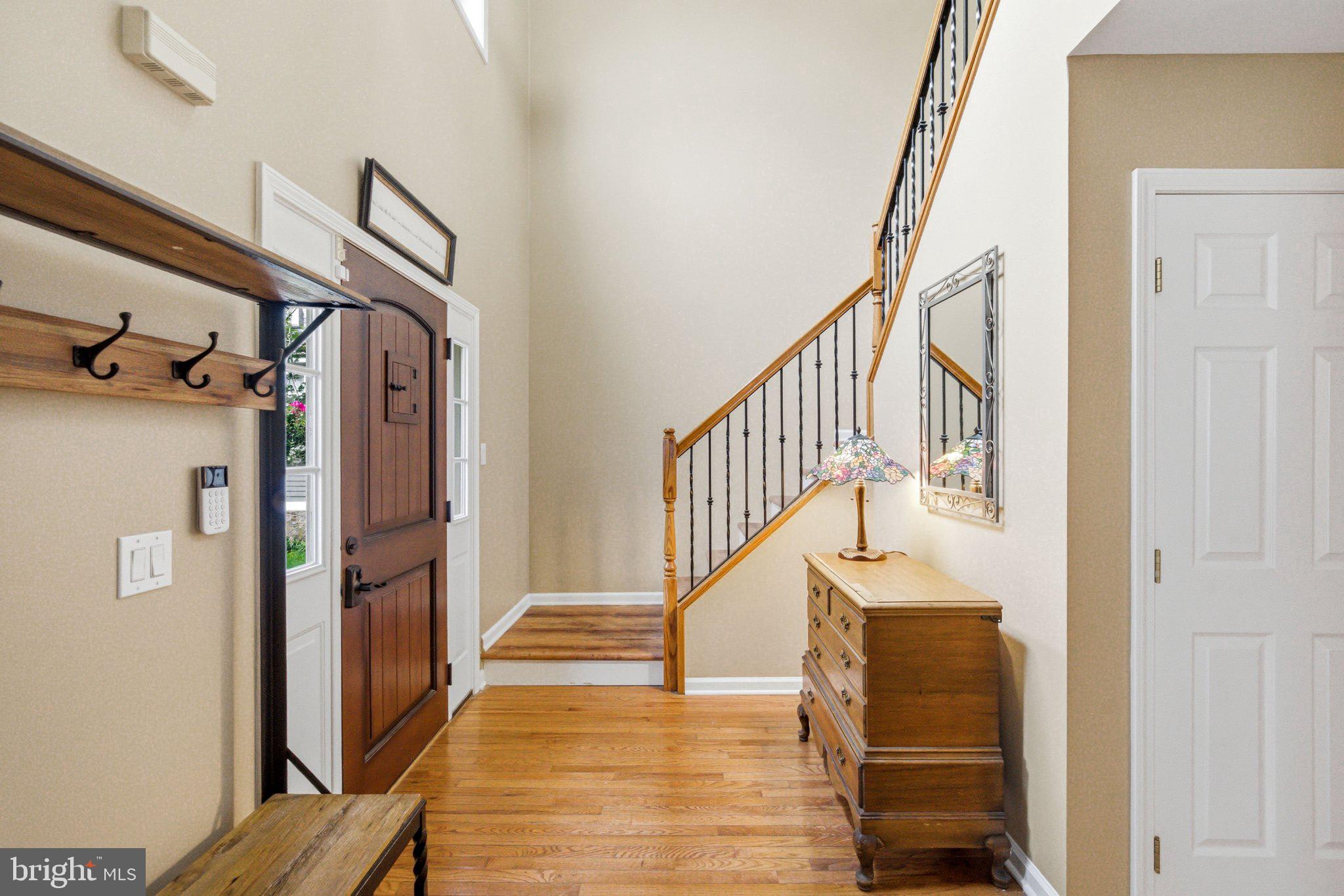706 Main Street Riverton, NJ 08077 - Photo 4 of 44 Inviting entryway with elegant staircase.
