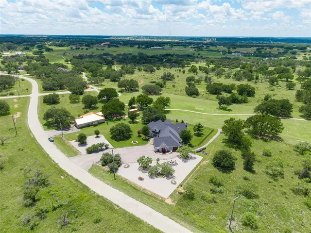 a view of a garden with an outdoor space