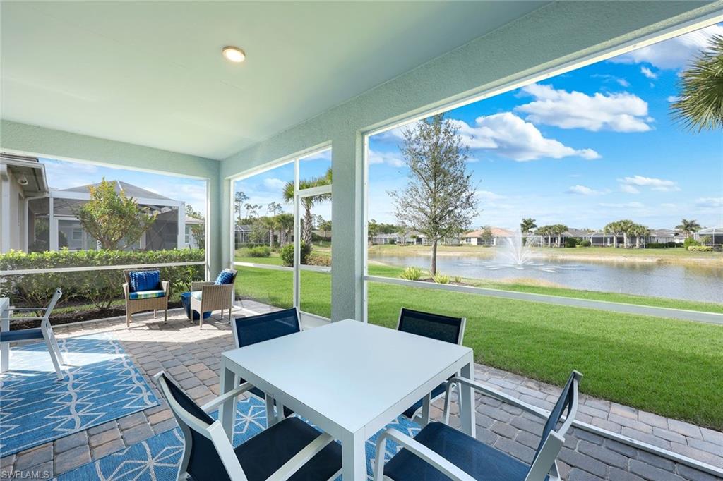 20052 Wymberly Way Estero, FL 33928 - Photo 19 of 27 a view of a patio with swimming pool and furniture