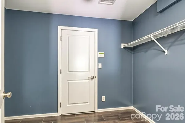 a view of small space with racks on the wall