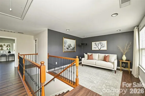 a view of livingroom with furniture and windows