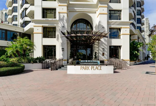 a view of a building with a bench in front of building
