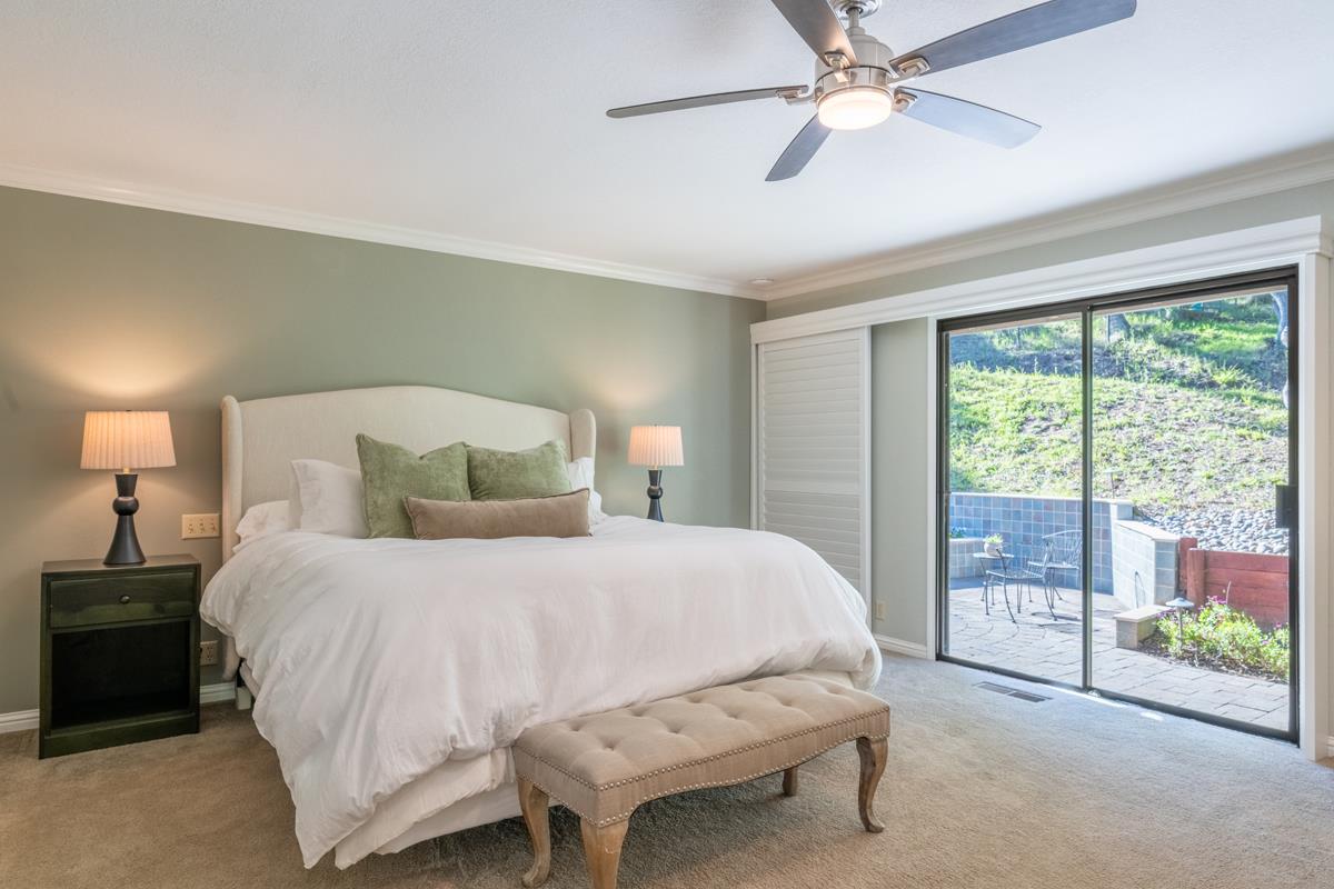 18795 Pesante Road Salinas, CA 93907 - Photo 9 of 20 a bedroom with a bed and a lamp