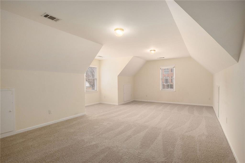 1389 Turtlebrook Lane Lawrenceville, GA 30043 - Photo 19 of 30 a view of an empty room with a window