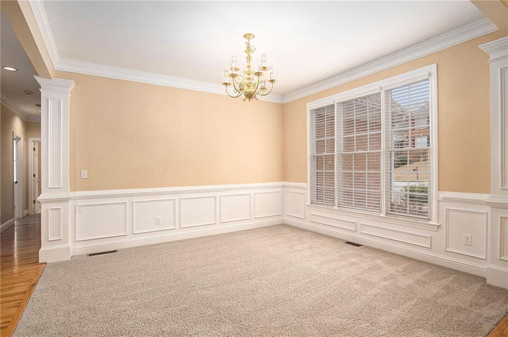 1389 Turtlebrook Lane Lawrenceville, GA 30043 - Photo 5 of 30 an empty room with windows