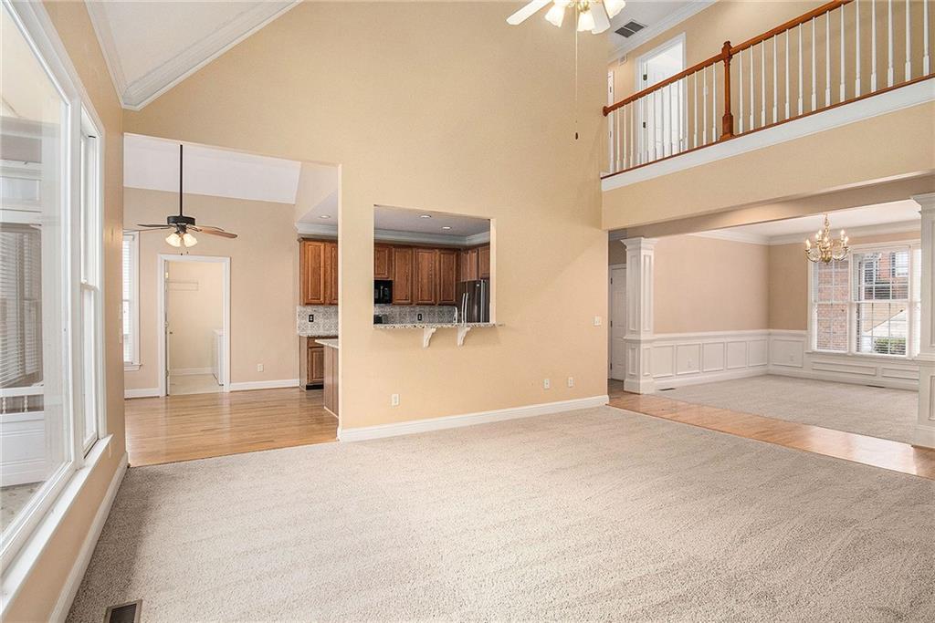 1389 Turtlebrook Lane Lawrenceville, GA 30043 - Photo 8 of 30 a view of a livingroom with a staircase