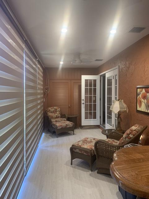 123 Lake Gloria Drive West Palm Beach, FL 33411 - Photo 13 of 25 a living room with furniture and a window