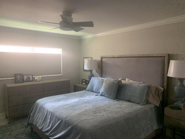 123 Lake Gloria Drive West Palm Beach, FL 33411 - Photo 14 of 25 a bedroom with a bed and a night stand