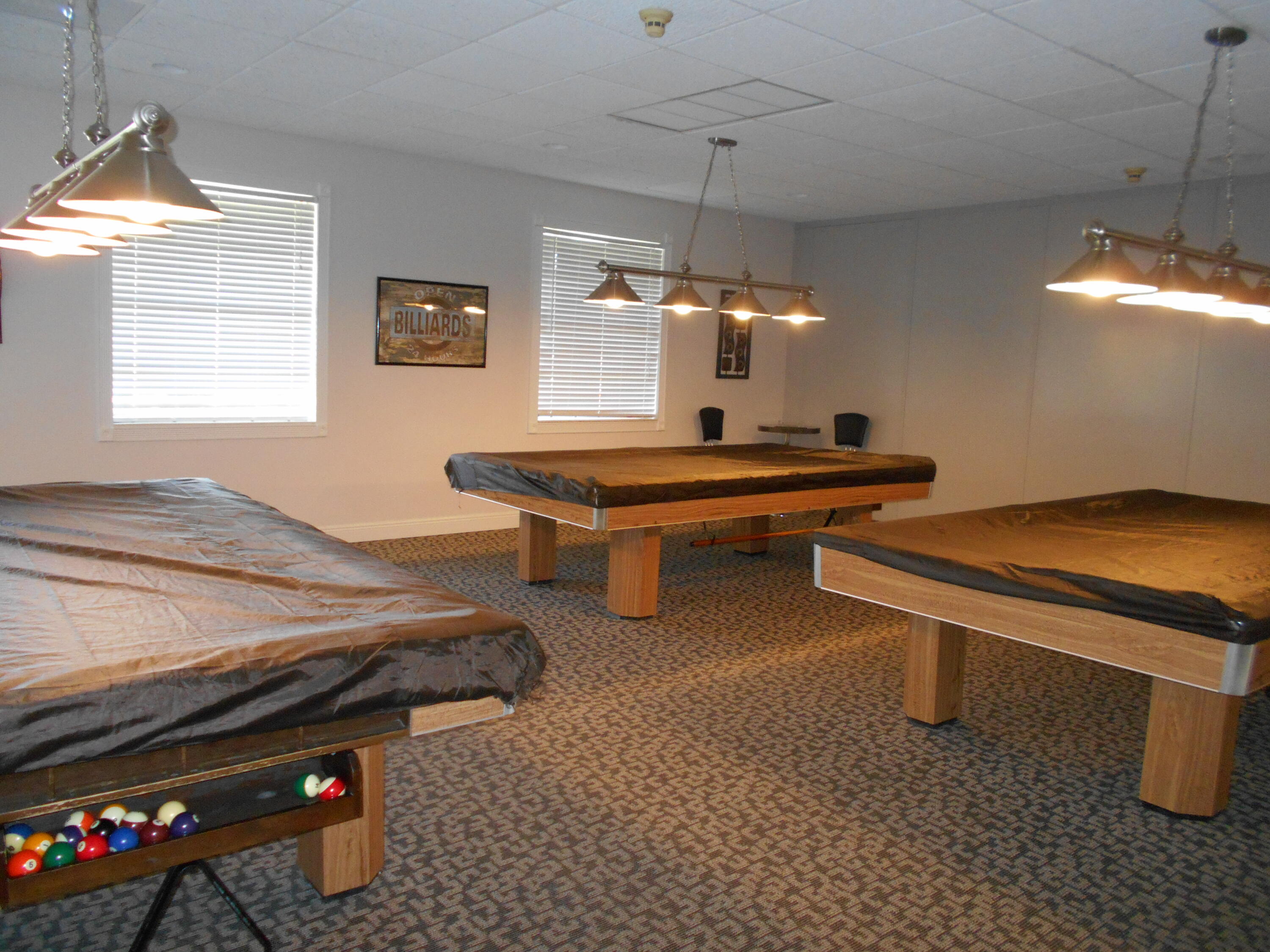 123 Lake Gloria Drive West Palm Beach, FL 33411 - Photo 24 of 25 a room with pool table and windows