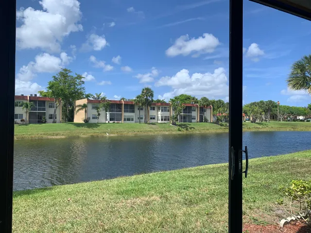 a view of a lake from a balcony
