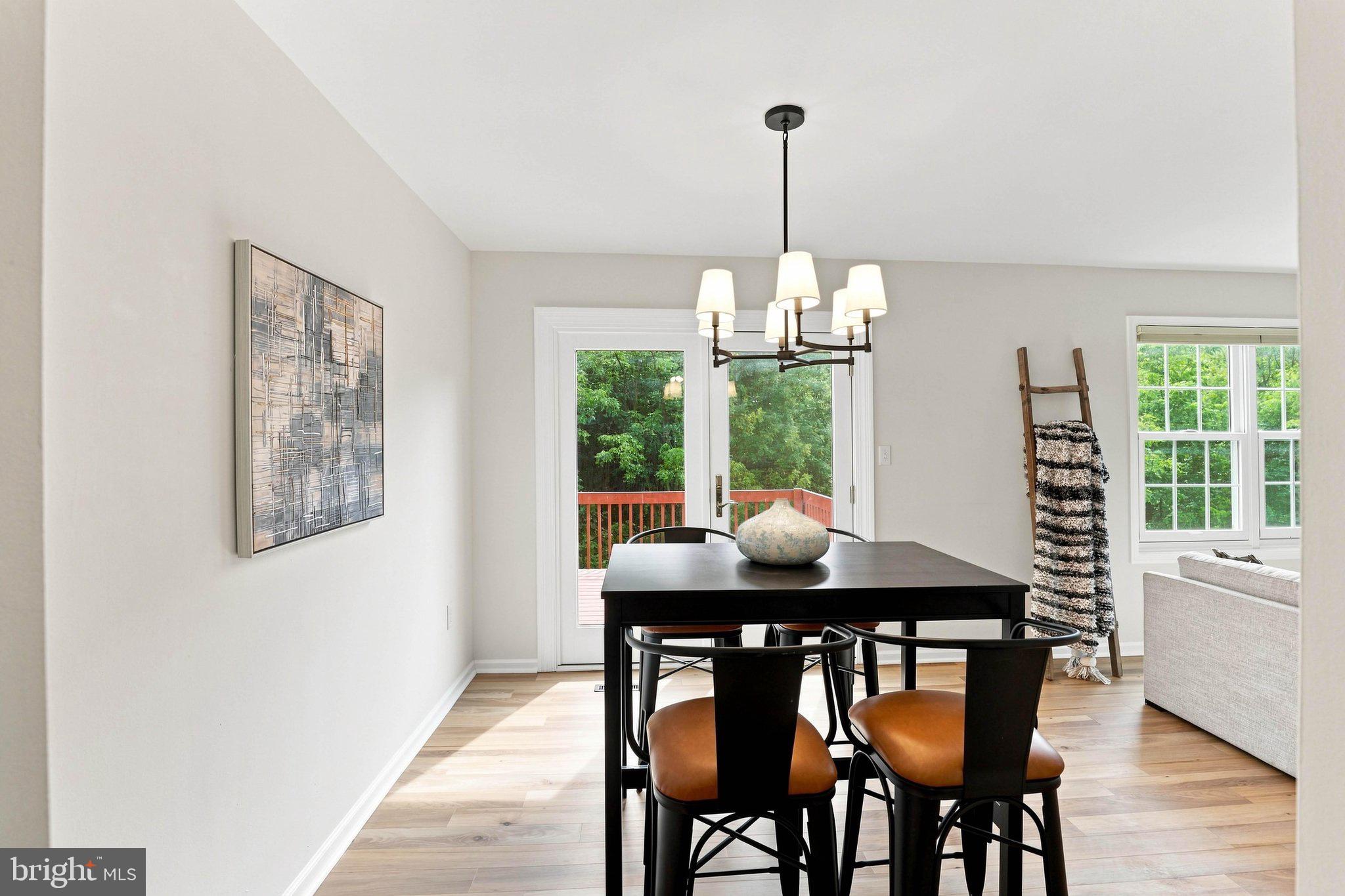 366 Crosswinds Drive Lititz, PA 17543 - Photo 8 of 35 Bright dining area with serene outdoor views.