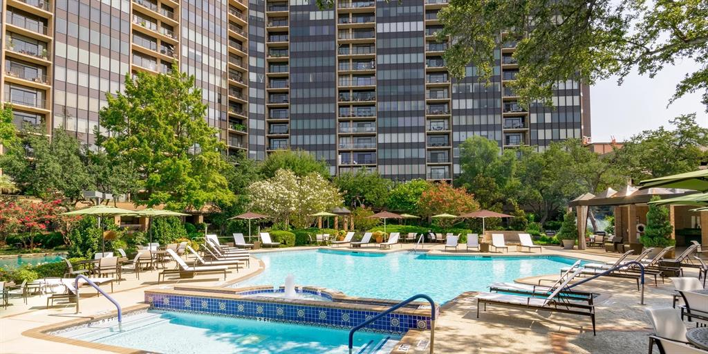 5200 Keller Springs Road, Unit 110 Dallas, TX 75248 - Photo 27 of 28 a view of a swimming pool with outdoor seating and plants