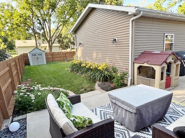 308 East Locust Street Normal, IL 61761 - Photo 30 of 40 a view of a patio with couches table and chairs and potted plants