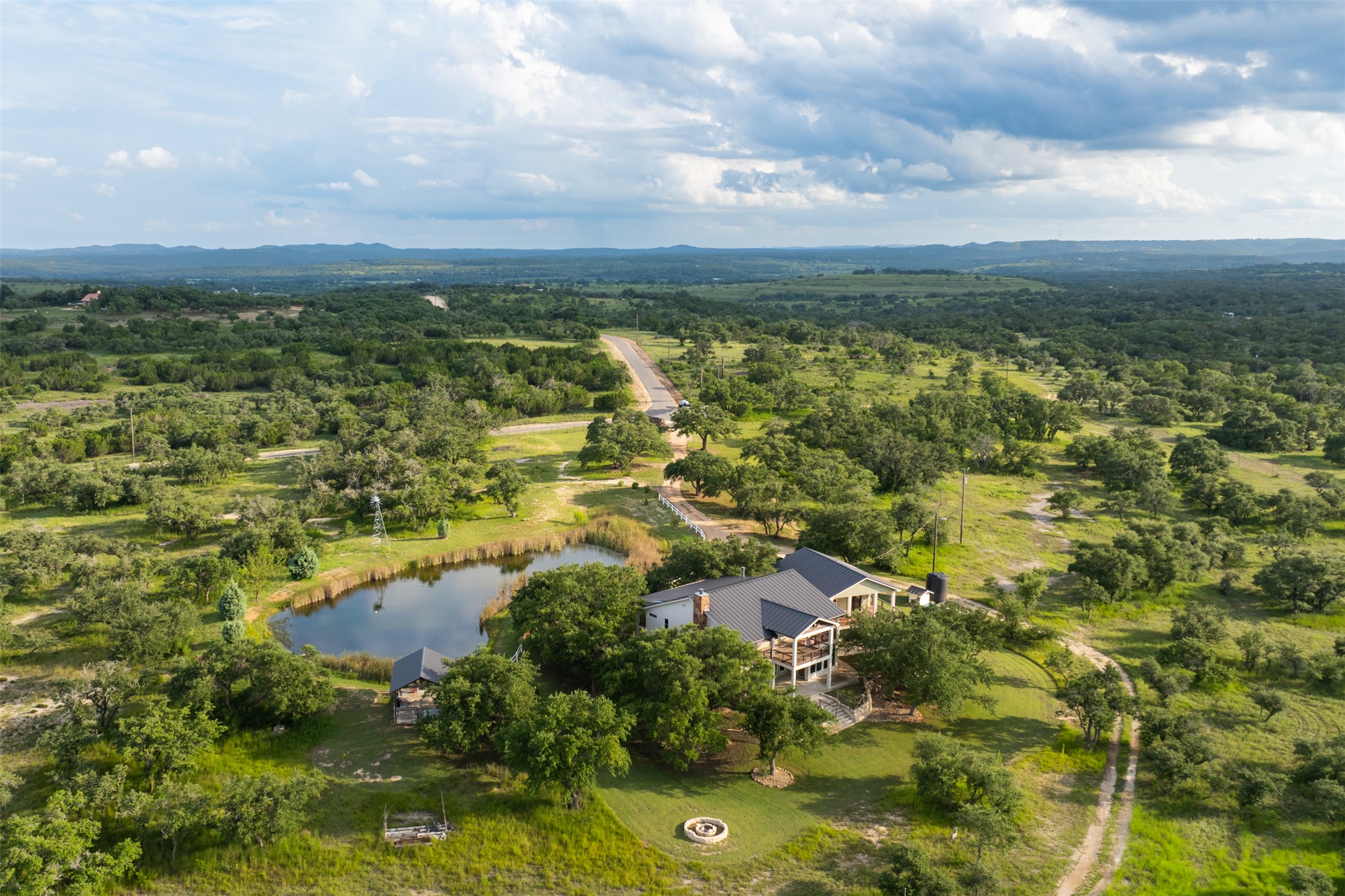 an aerial view of residential houses with outdoor space