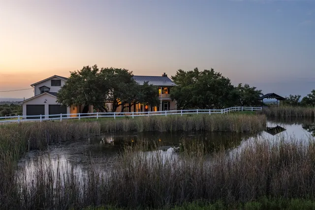 a view of a lake in front of house