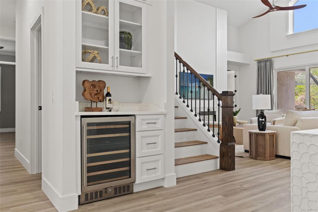 11627 Renaissance View Court Tampa, FL 33626 - Photo 12 of 62 a view of a hallway with wooden floor and staircase