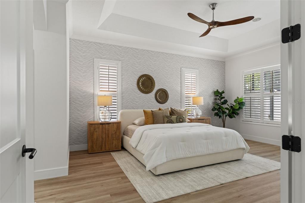 11627 Renaissance View Court Tampa, FL 33626 - Photo 13 of 62 a bedroom with a large bed and two windows
