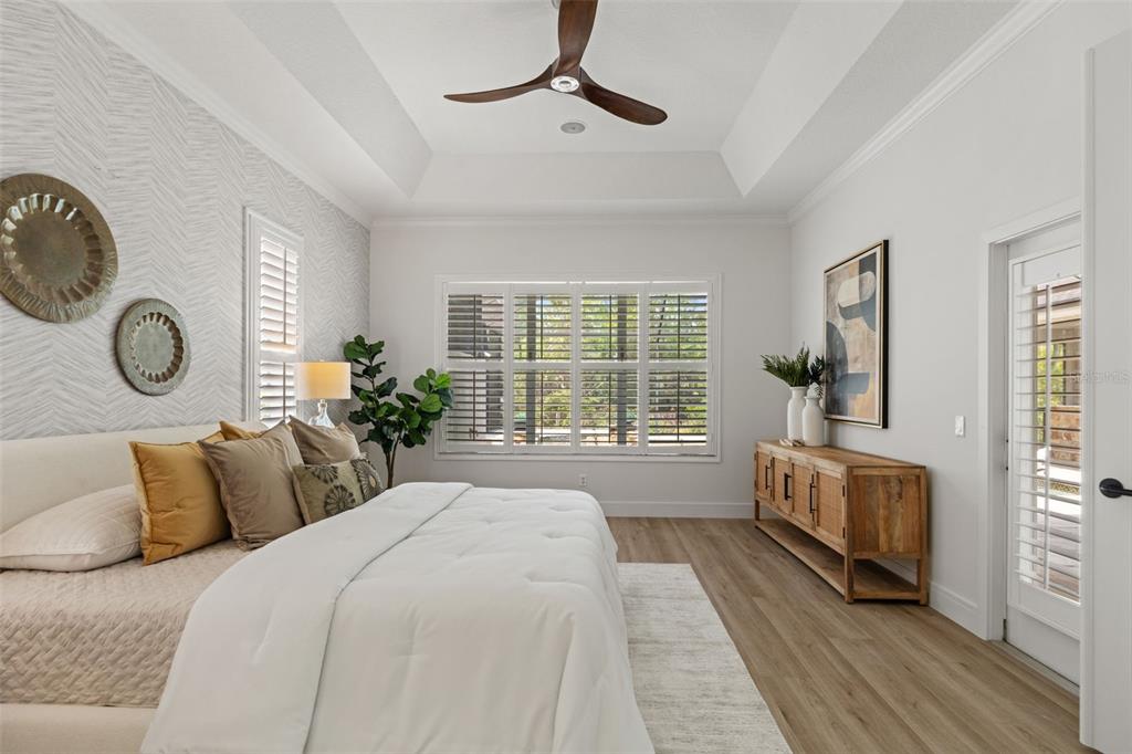 11627 Renaissance View Court Tampa, FL 33626 - Photo 14 of 62 a bed sitting in a bedroom next to a window