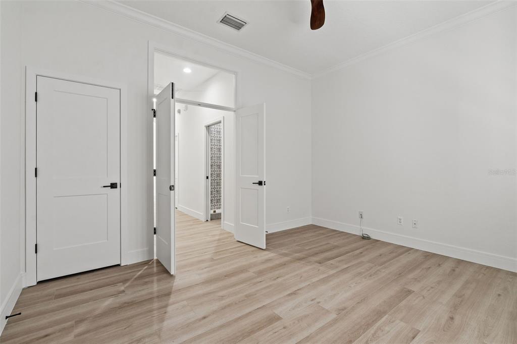 11627 Renaissance View Court Tampa, FL 33626 - Photo 20 of 62 a view of an empty room with wooden floor