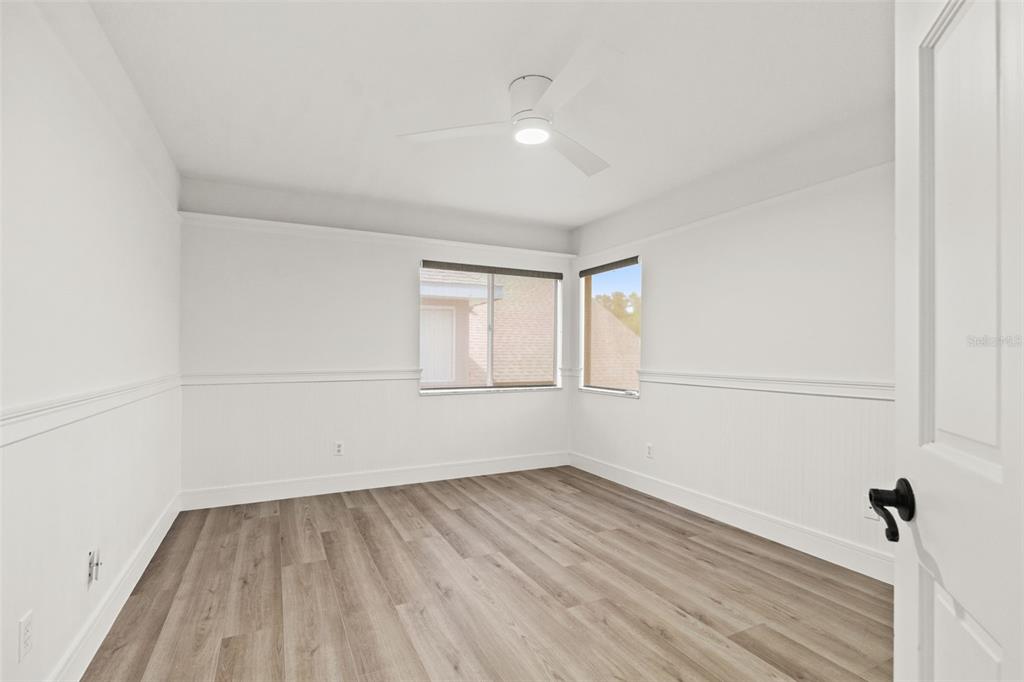 11627 Renaissance View Court Tampa, FL 33626 - Photo 27 of 62 a view of a room that has wooden floor and brick walls
