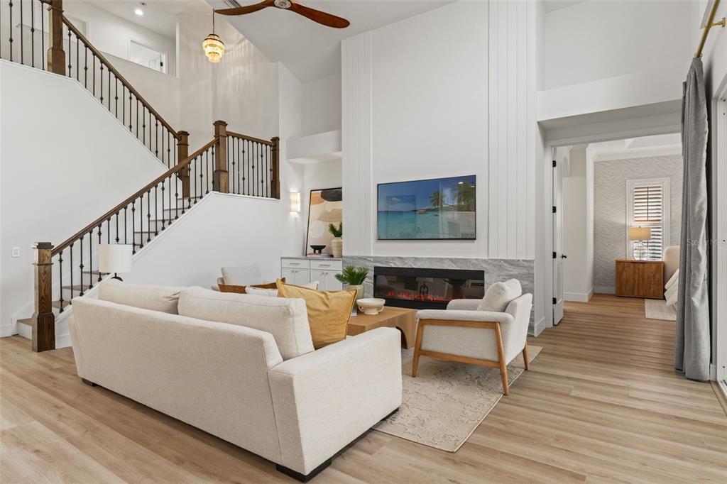 11627 Renaissance View Court Tampa, FL 33626 - Photo 40 of 62 a living room with furniture and wooden floor