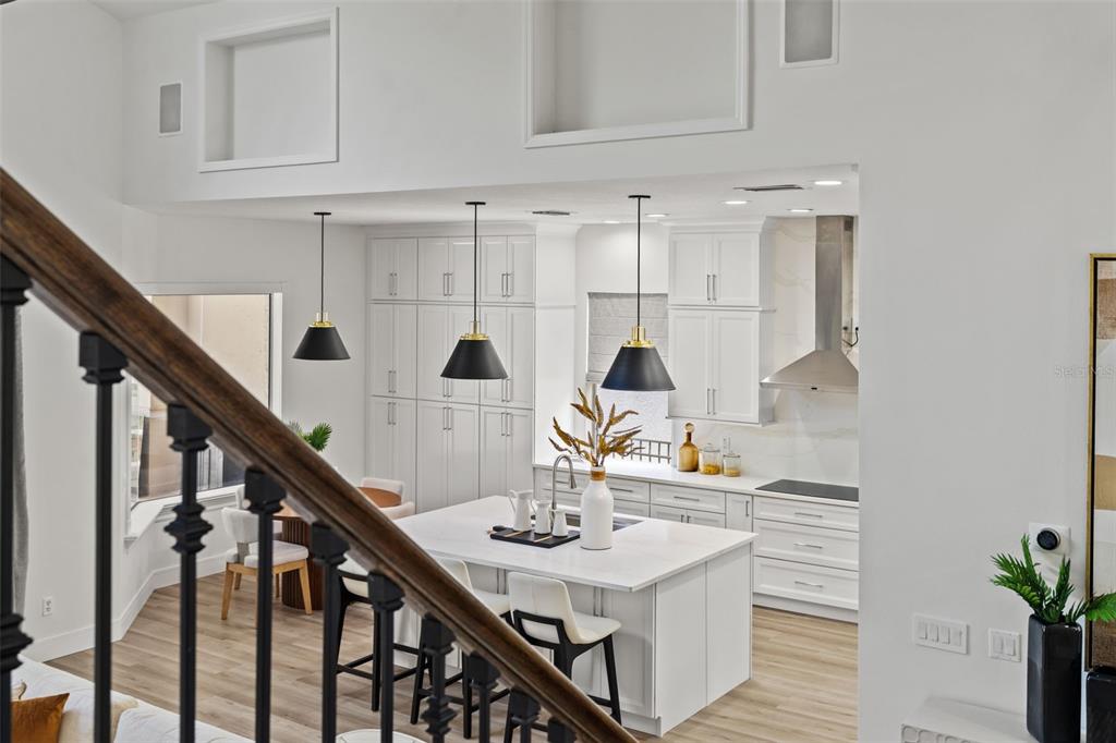 11627 Renaissance View Court Tampa, FL 33626 - Photo 56 of 62 a kitchen with stainless steel appliances a sink and cabinets