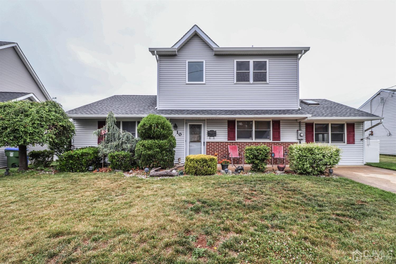 10 Matson Road Edison, NJ 08817 - Photo 1 of 40 a front view of a house with garden