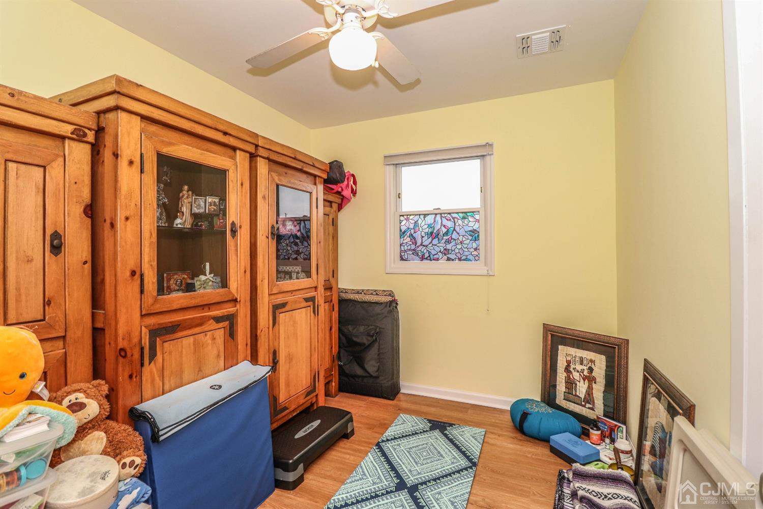 10 Matson Road Edison, NJ 08817 - Photo 22 of 40 a view of a workspace with furniture and a window