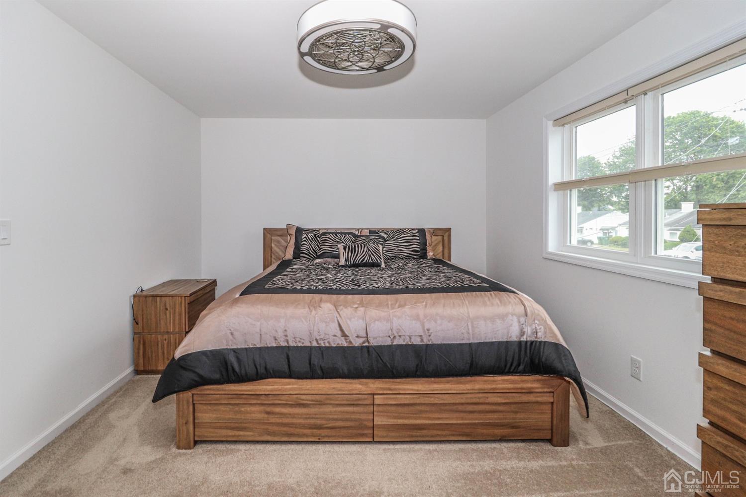 10 Matson Road Edison, NJ 08817 - Photo 29 of 40 a bedroom with a bed and a window