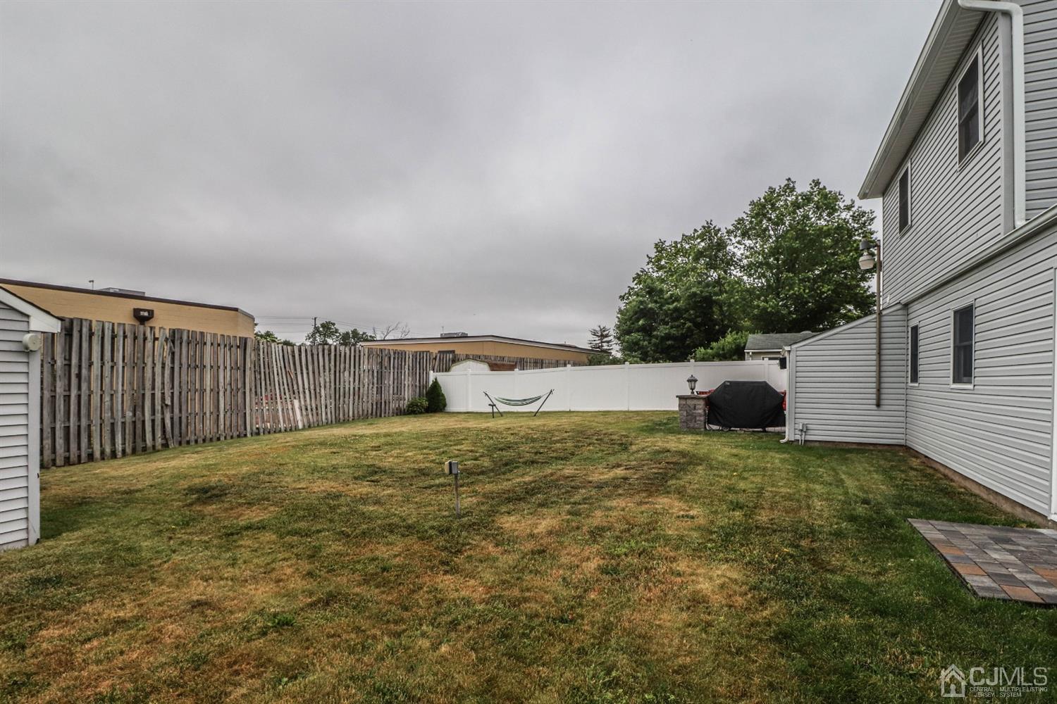 10 Matson Road Edison, NJ 08817 - Photo 40 of 40 a backyard of a house with a table and chair