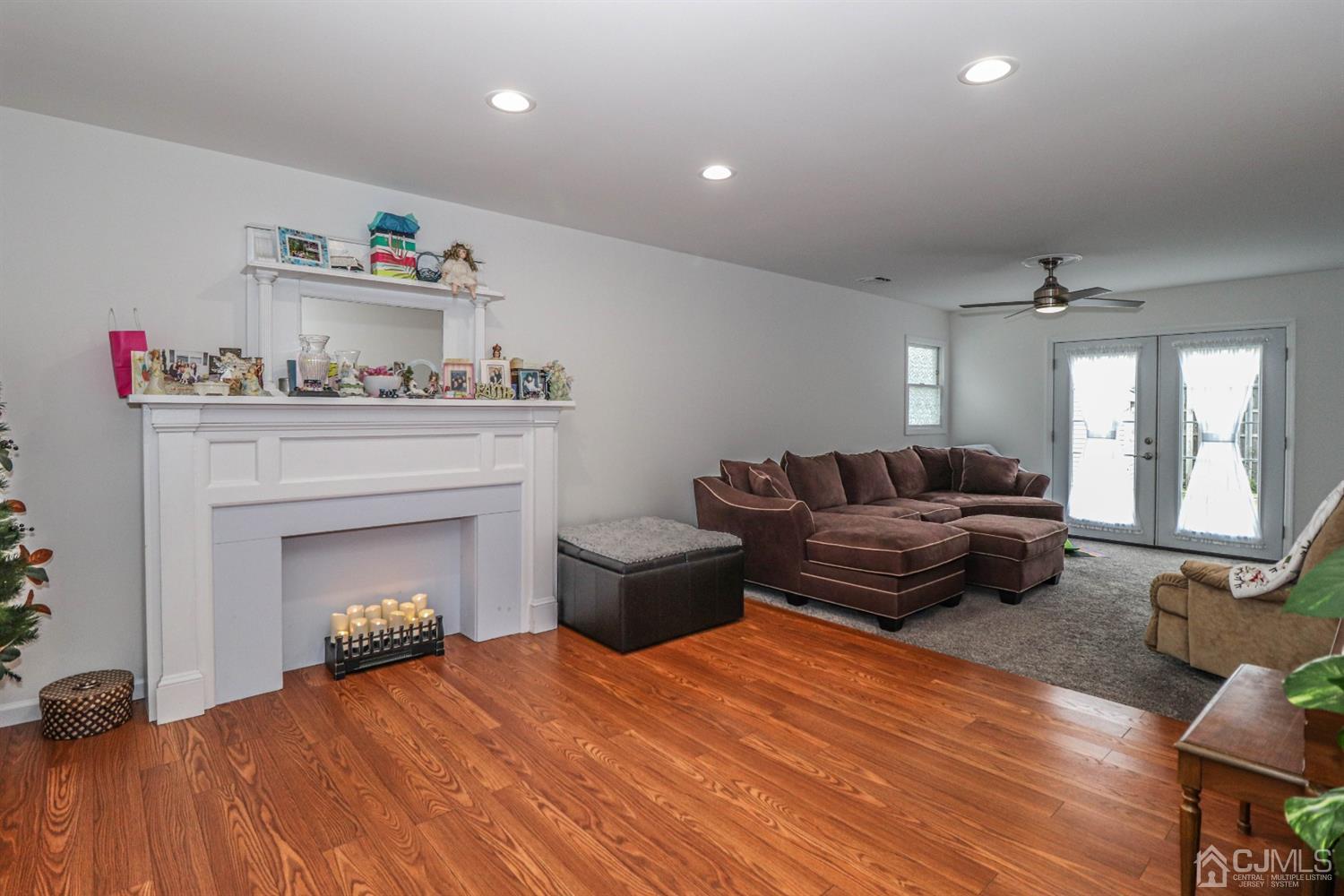 10 Matson Road Edison, NJ 08817 - Photo 6 of 40 a living room with furniture and a fireplace