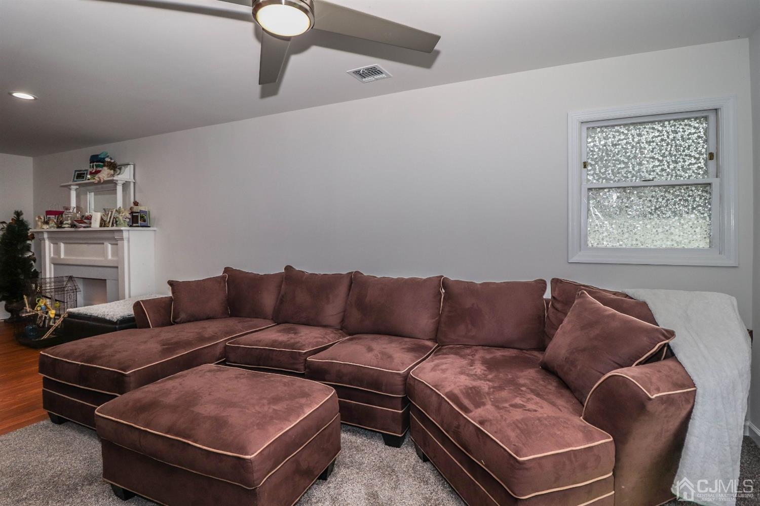 10 Matson Road Edison, NJ 08817 - Photo 10 of 40 a living room with furniture and a window