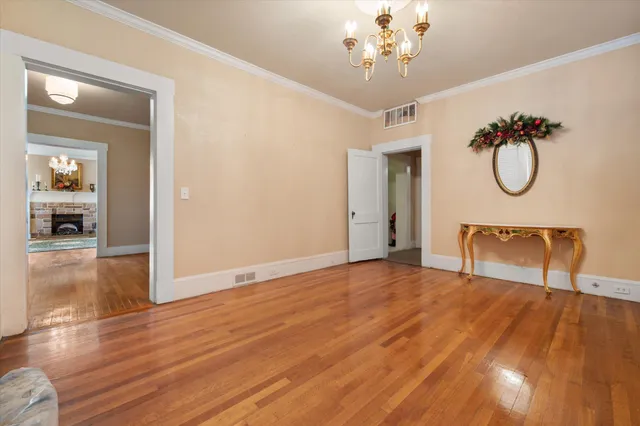 a view of a livingroom with a white umbrella