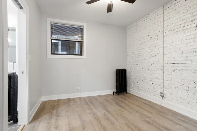 an empty room with a empty space and a window