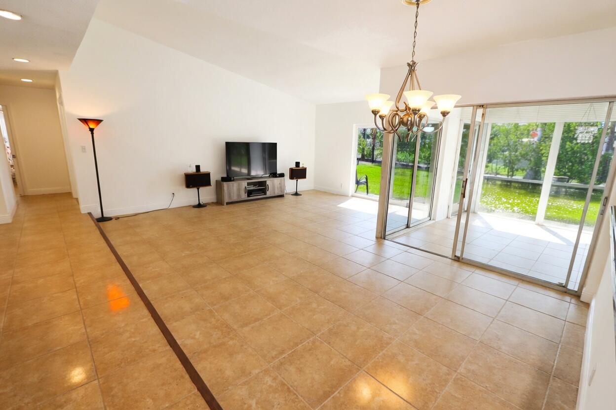 5667 North Cameo Drive Boca Raton, FL 33433 - Photo 6 of 20 a very nice looking room with a large window