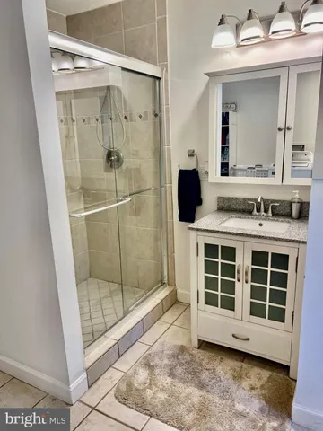 a bedroom with double bed and a closet