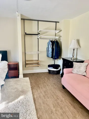 a living room with couch and flat screen tv