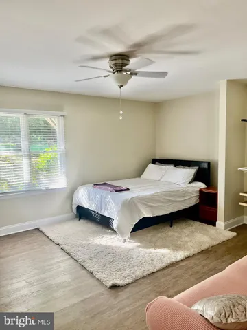 a room with gym equipment and a window