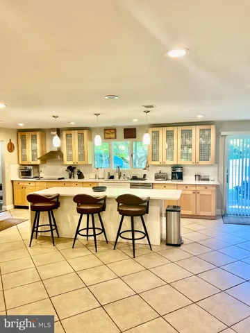a living room with furniture window and flat screen tv