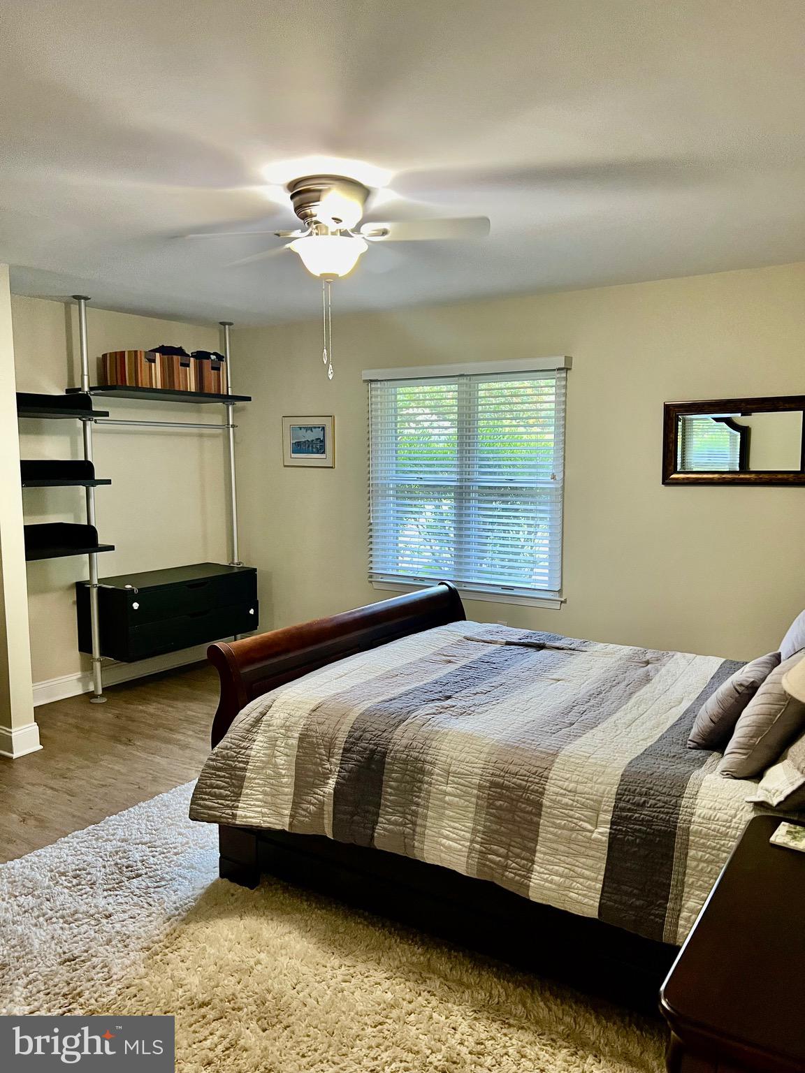 1542 Crowell Road Vienna, VA 22182 - Photo 36 of 55 a bedroom with a bed and dresser