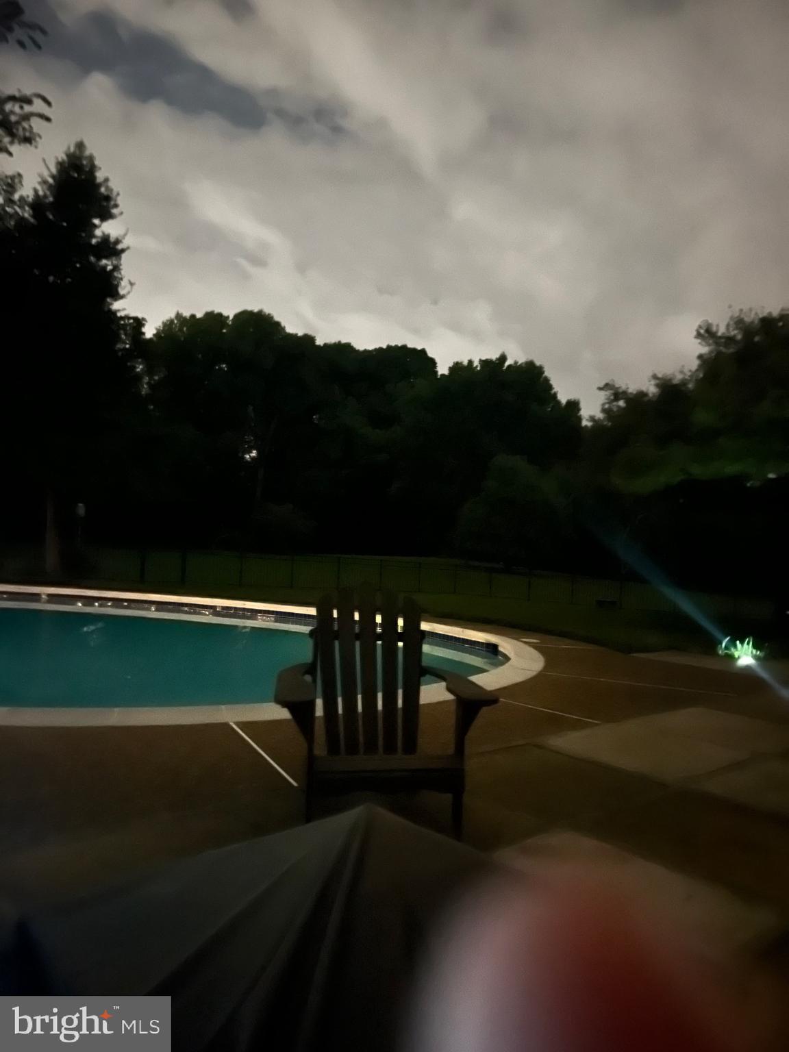 1542 Crowell Road Vienna, VA 22182 - Photo 50 of 55 a view of swimming pool outdoor seating and city view