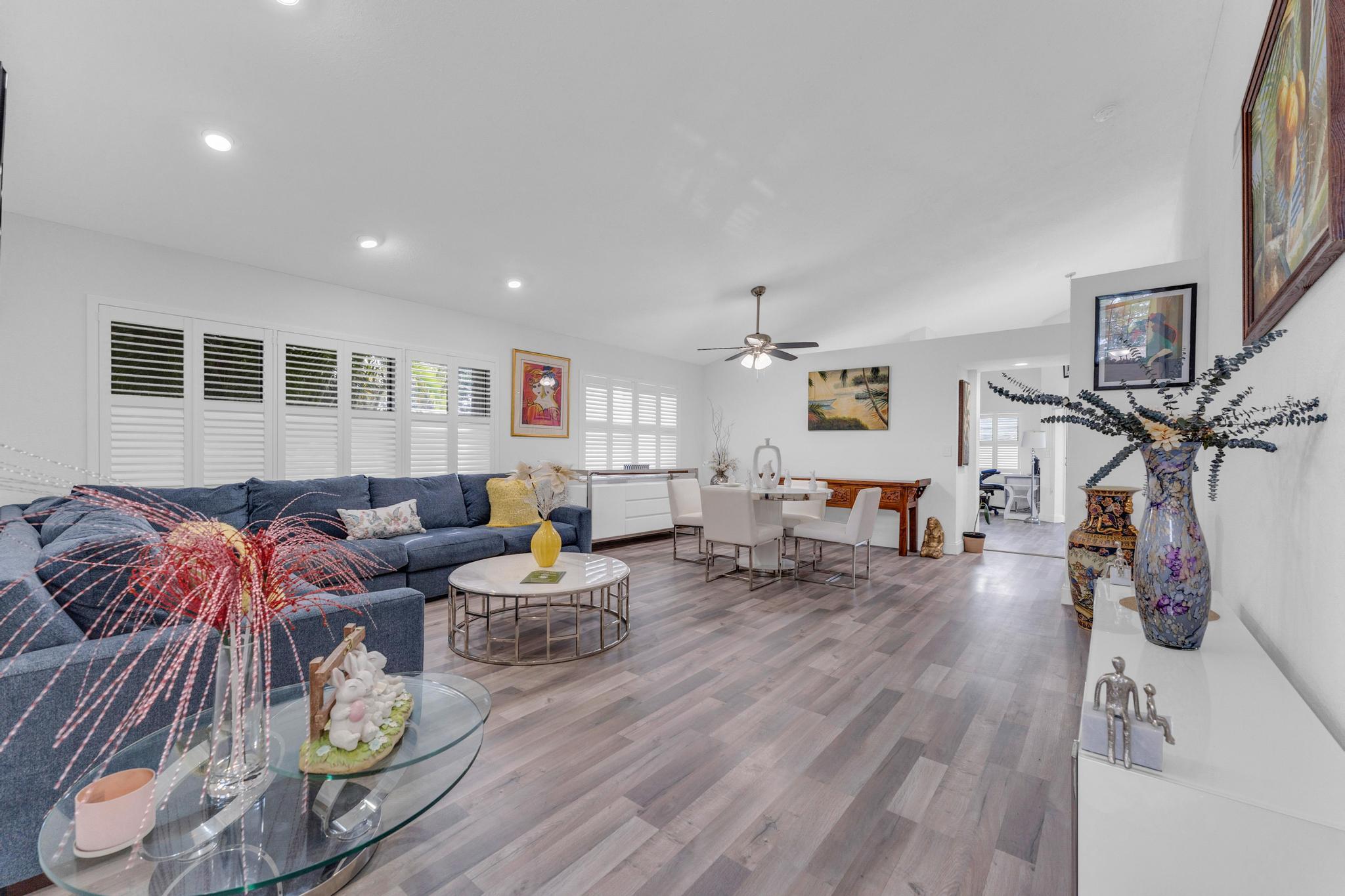 11120 Sangria Court Boca Raton, FL 33498 - Photo 23 of 34 a living room with furniture and wooden floor