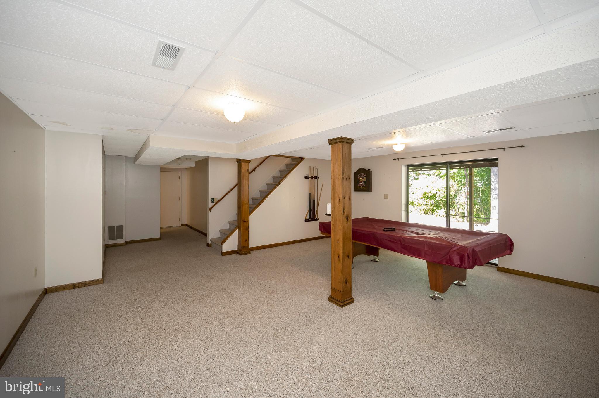 204 Freedom Road Locust Grove, VA 22508 - Photo 23 of 42 a room with pool table windows and furniture