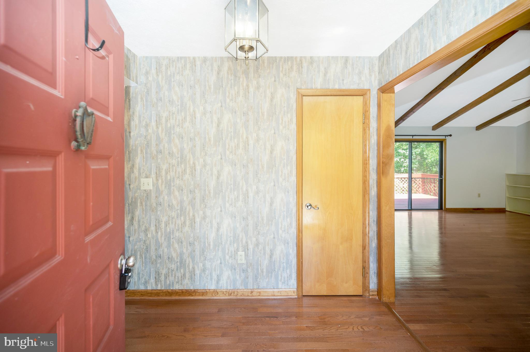 204 Freedom Road Locust Grove, VA 22508 - Photo 4 of 42 a view of a bathroom with wooden floor and a window