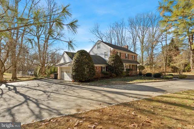 a view of a building with a snow in the background