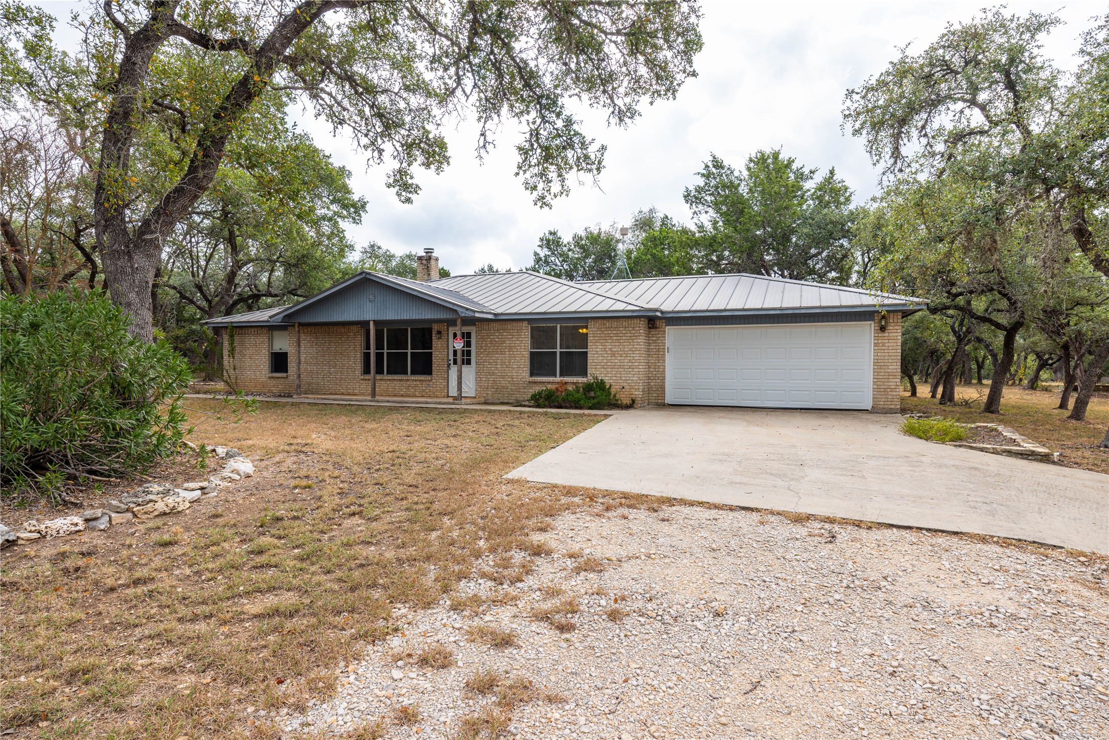 2501 Fischer Store Road Wimberley, TX 78676 - Photo 1 of 23 Font of main house.